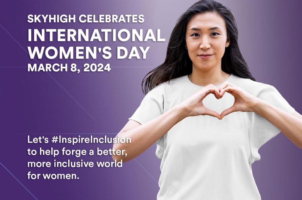 International Women's Day sign, with woman holding her hands in the shape of a heart