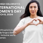 International Women's Day sign, with woman holding her hands in the shape of a heart, spot-color version